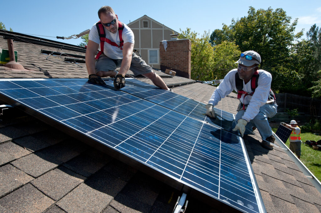 show a residential roof overwhelmed with solar panels, highlighting the issues of overloading. 